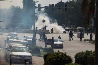 Nigerian police fire tear gas as protesters gather over separatist leader