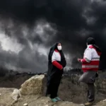 Black rain is falling in Iran after strikes on oil facilities. Scientists warn of long-term consequences