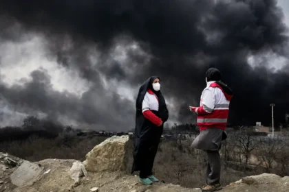 Black rain is falling in Iran after strikes on oil facilities. Scientists warn of long-term consequences