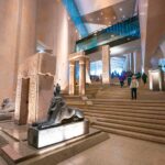 What are the must-see exhibits and surrounding attractions at the Grand Egyptian Museum for travelers right now?